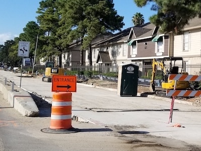 Texas Outhouse portable toilet located at a large road construction project in Houston