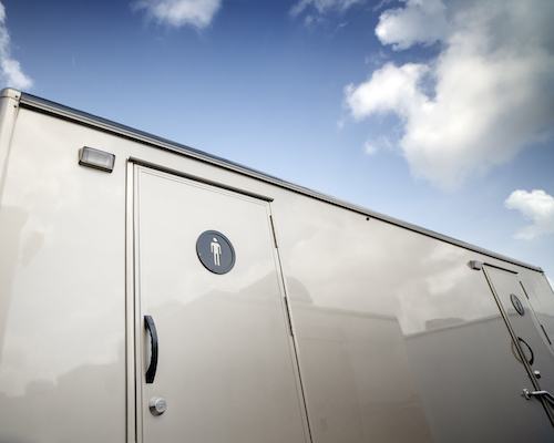 A luxury restroom trailer ready for rental.