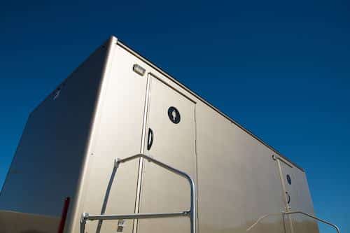 A luxury restroom trailer supporting a fancy portable toilet rental via Texas Outhouse in Houston