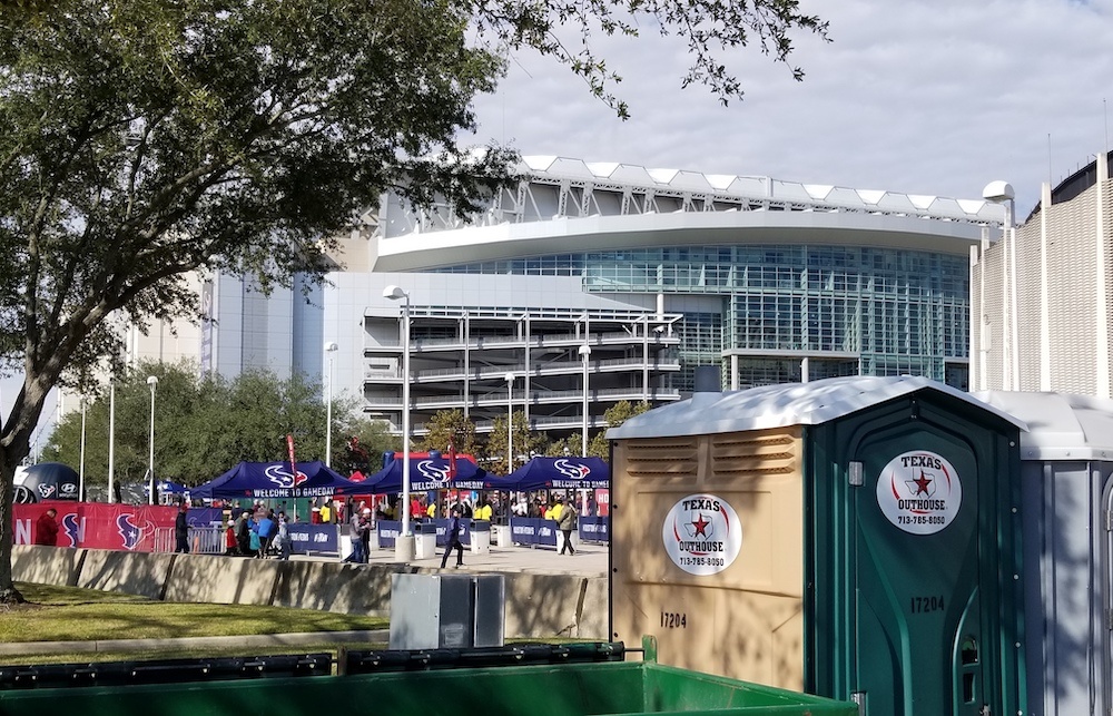 Sporting event portable toilets set up at NRG Stadium in Houston, TX for Texans Football Gameday