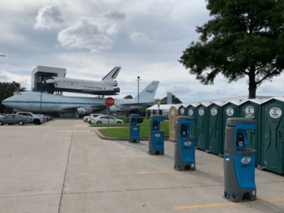 Texas Outhouse portable toilets lined up for a special event at NASA in Houston