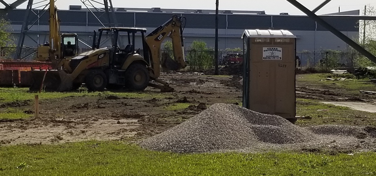 Texas Outhouse portable toilet at a construction project
