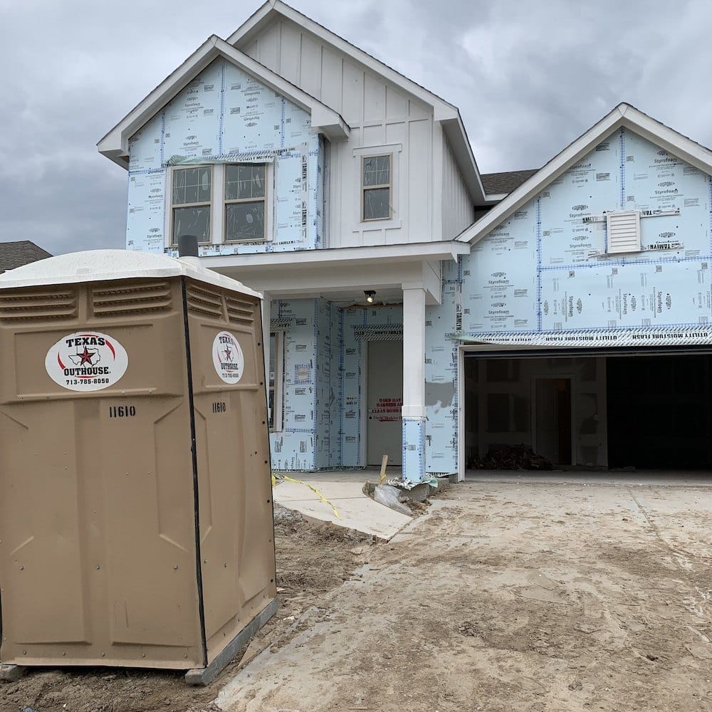 Texas Outhouse portable toilets at a residential construction site