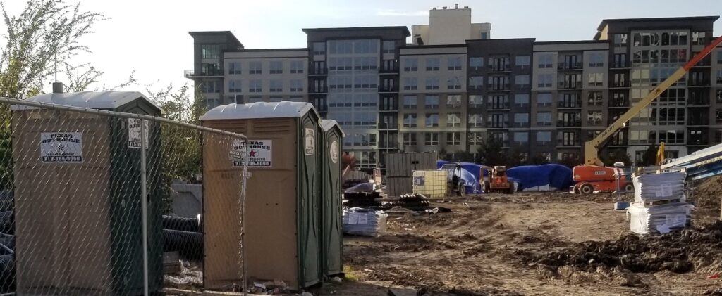 Texas Outhouse portable toilets at a construction site