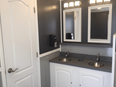 Inside look at a VIP restroom trailer option from Texas Outhouse and Luxury Event Trailers