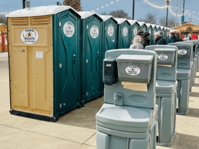 Texas Outhouse portable toilets and handwash stations positioned near an event in Houston